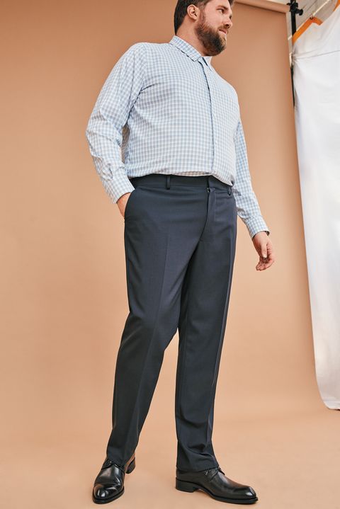 Clothing, Suit, Dress shirt, Standing, Formal wear, Human, Suit trousers, Trousers, Footwear, Shirt, 