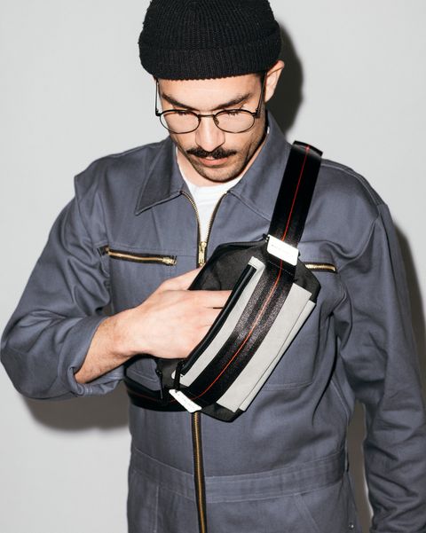 man wearing freitag bag