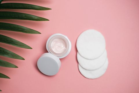 Face cream and cotton pad