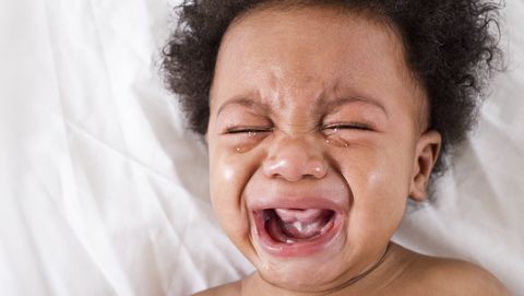 face of crying african american baby