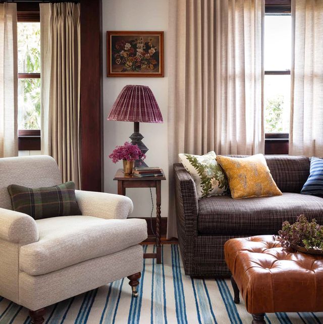 contemporary living room with plaid fabric decorated for fall