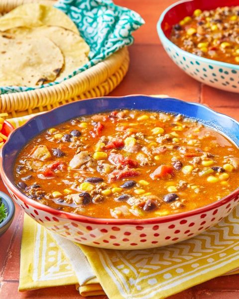 taco soup with tortillas in back