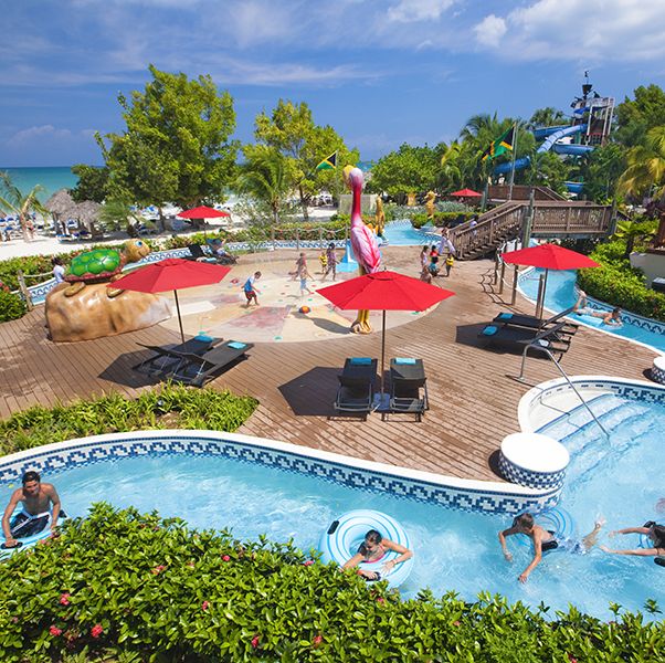 a pool area complete with lazy river at beaches negril, a good housekeeping pick for best family vacation destination