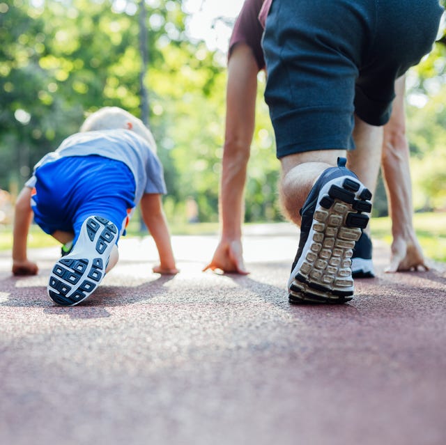 father and son preparing to run