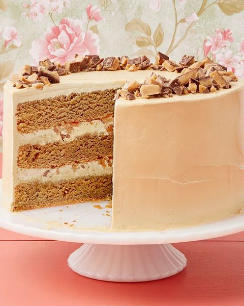 coffee toffee crunch cake frosted on cake stand