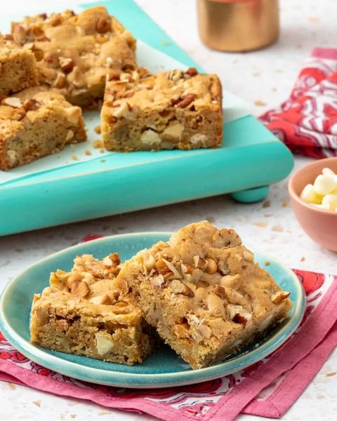 blondies with nuts on blue plate