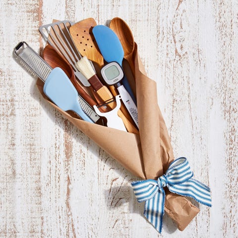 Father's Day Gift Basket - Kitchen Tool Bro-quet kitchen spatulas, thermometer, and microplane grater wrapped in brown craft paper and tied with blue and white stripe ribbon to resemble a bouquet for a fathers day gift basket