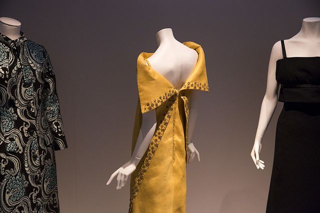 london, england   april 02  a federico forquet yellow winged evening dress on display at the victoria and albert museum's glamour of italian fashion 1945 2014 exhibition on april 2, 2014 in london, england  the va is putting the finishing touches to its exhibition the glamour of italian fashion 1945 2014 which opens to the public on april 5, 2014 the show, curated by sonnet stanfill, displays around 120 ensembles and accessories by leading italian fashion houses and influential contributors to fashion from the end of the second world war to the present  photo by rob stothardgetty images