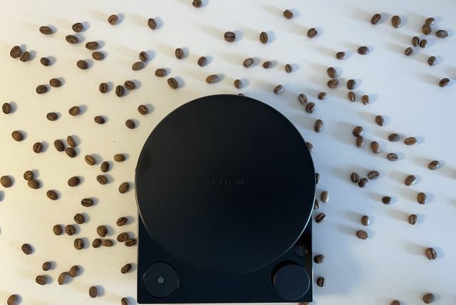 the fellow tally pro coffee scale surrounded by coffee beans