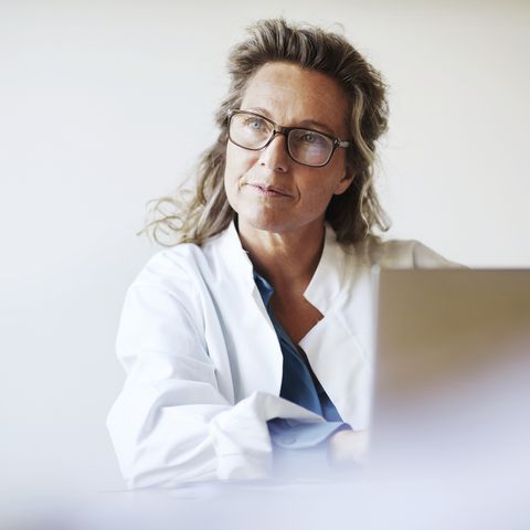 female doctor using laptop
