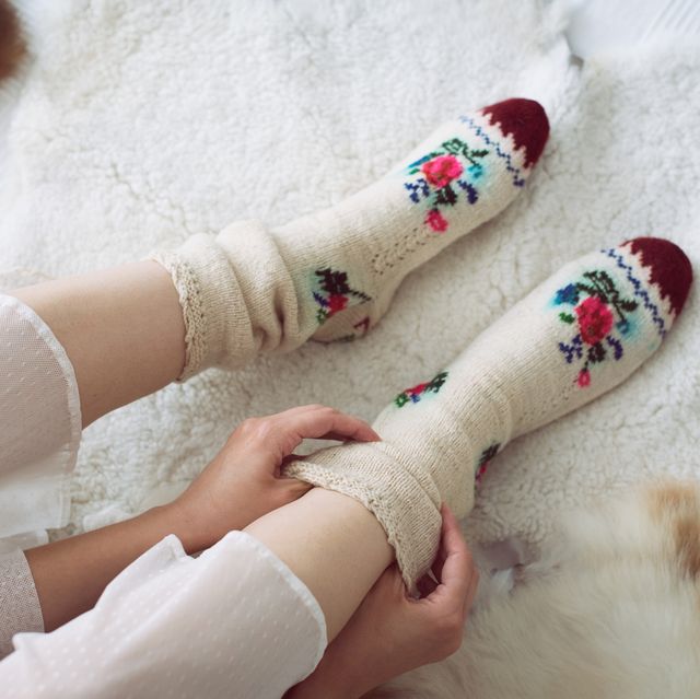 female legs in knitted socks