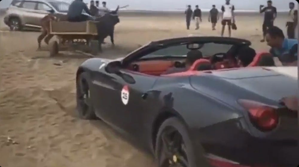 Ferrari California Winds Up Stuck on Beach, Gets Saved by Oxen