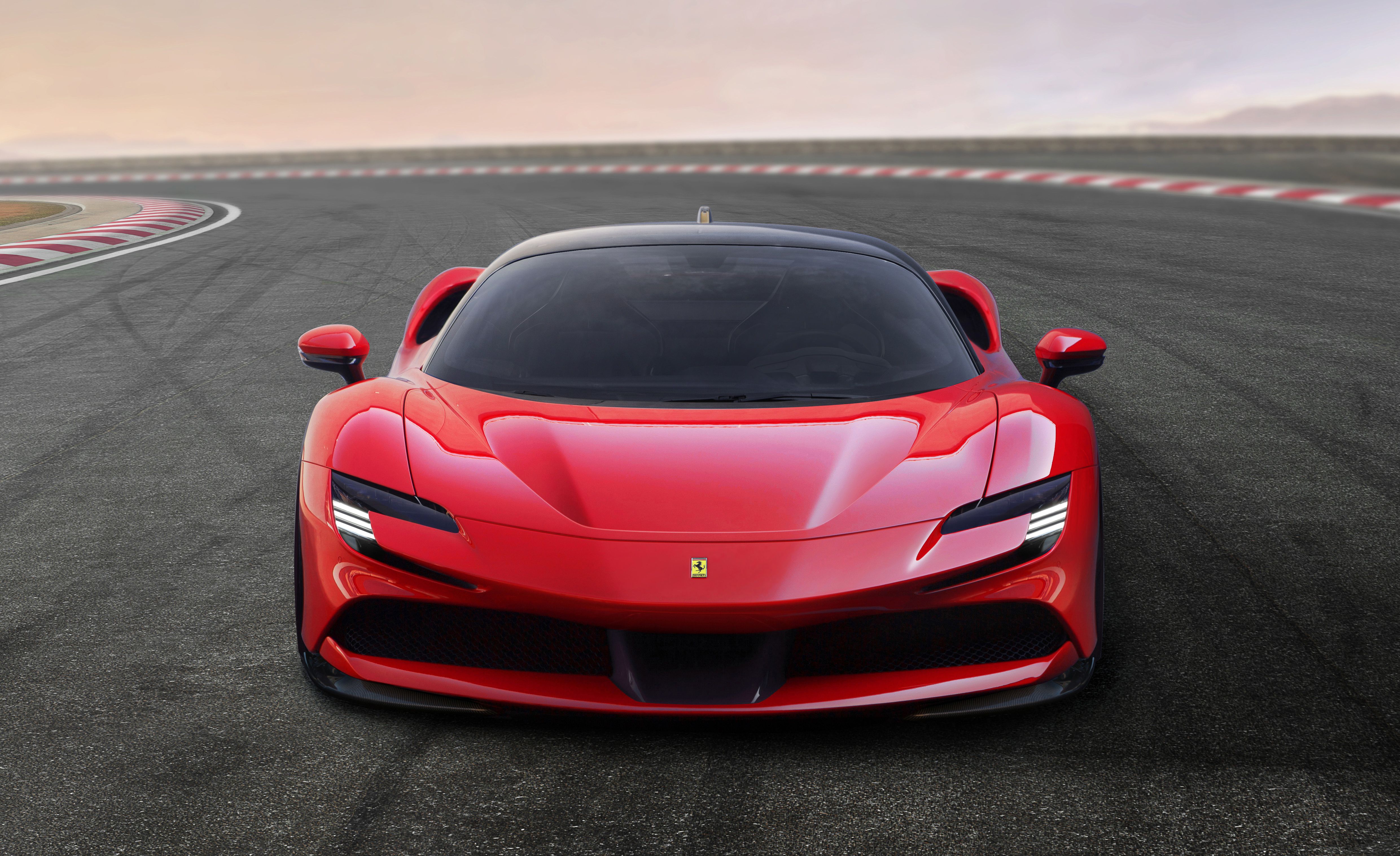 986 hp ferrari sf90 stradale new plug in hybrid hypercar car and driver