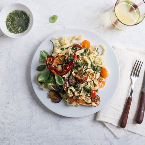 fettucine with roasted  colorful vegetables and parsley  pesto