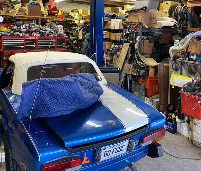 a look inside fun imported auto and toys, a packed auto shop in connecticut that specializes in parts for old fiats