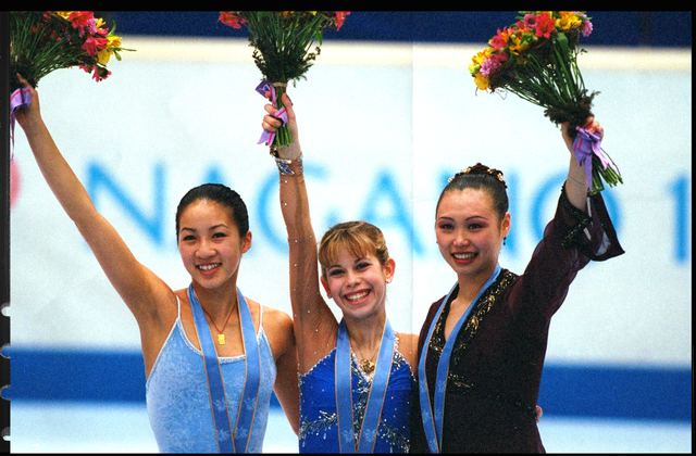 20 feb 1998 michelle kwan of the usa won the silver medal, tara lipinski of the usa won the gold medal and lu chen of china won the bronze medal in the free skate at white ring arena during the 1998 winter olympic games in nagano, japan mandatory credi