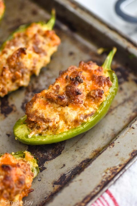 sausage stuffed jalapenos  on sheet tray