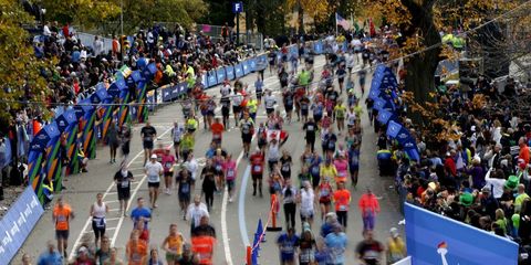 Runners stream to the finish line of the 2015 New York City Marathon.  