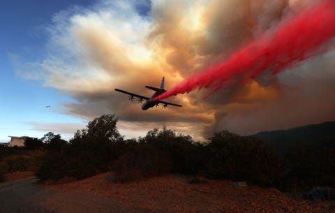 https://hips.hearstapps.com/hmg-prod.s3.amazonaws.com/images/firefighting-aircraft-drops-retardant-ahead-of-the-lnu-news-photo-1598304314.jpg?resize=480:*