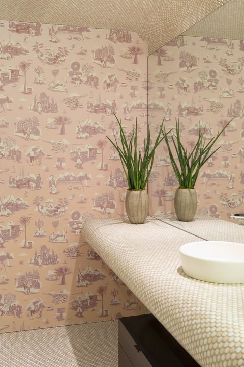 bathroom with pink wallpaper