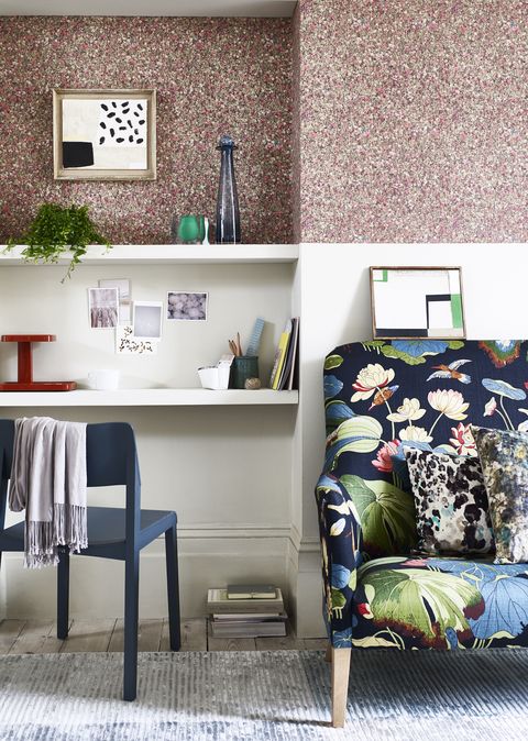 study or home office with floral wallpaper feature wall