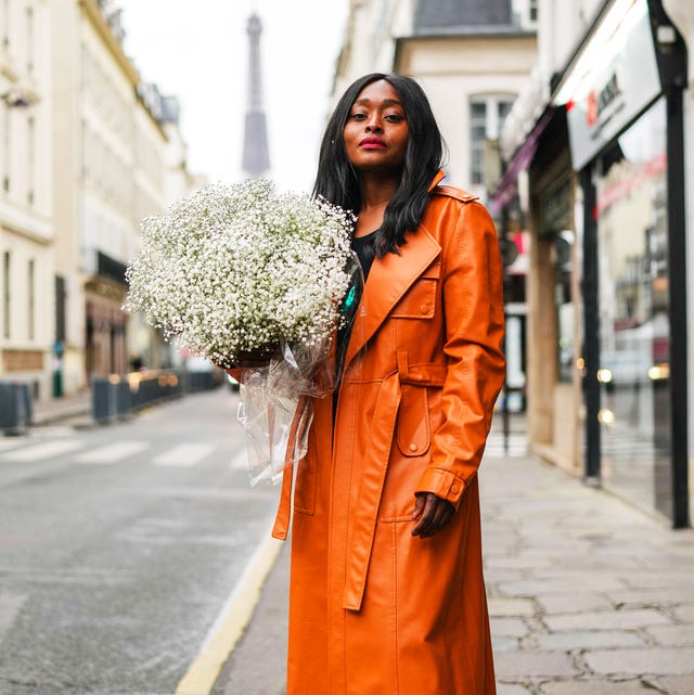 woman holding a bouquet of flowers
