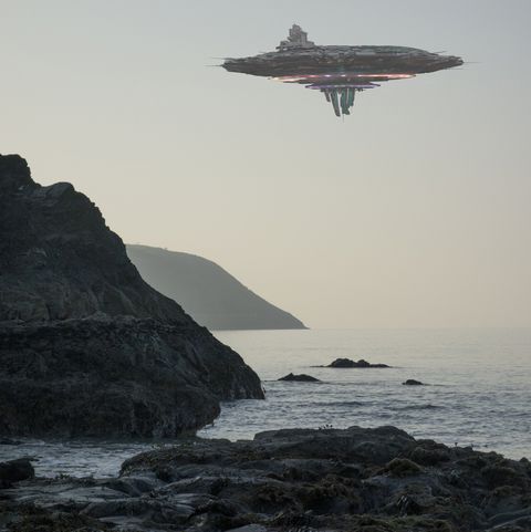 alien and space theories photo of ufo over ocean