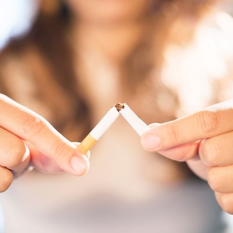 focus hand, women quit smoking for good health of oneself