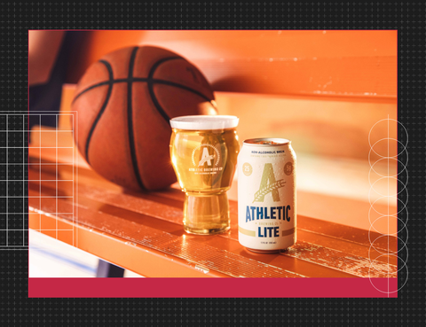 a can and glass on a bleacher with a basketball