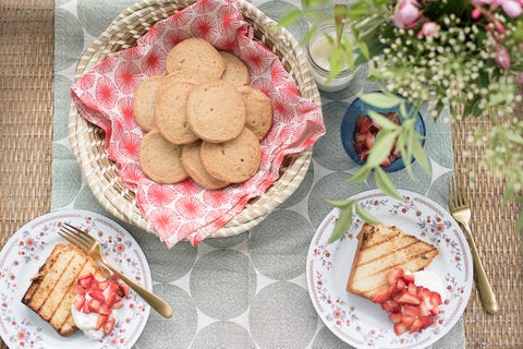 sliced grilled cake on plates with tea cakes in basket, as seen on the juneteenth menu