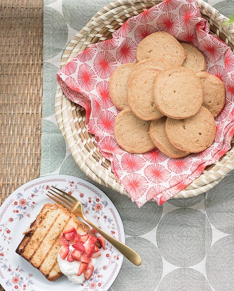 sliced grilled cake on plates with tea cakes in basket, as seen on the juneteenth menu