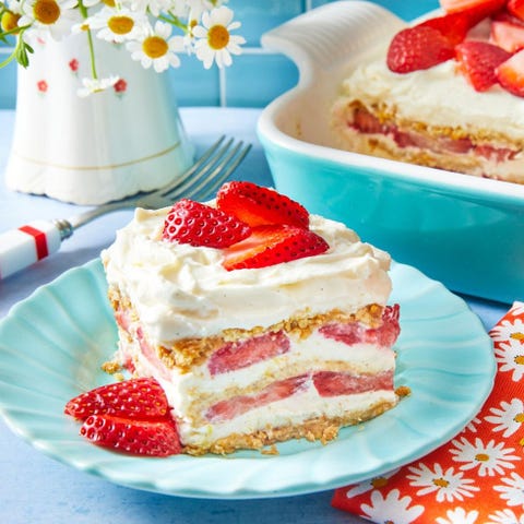 strawberry icebox cake slice on blue plate