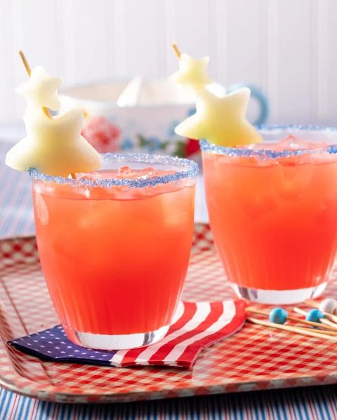 red white and blue cocktail with melon stars