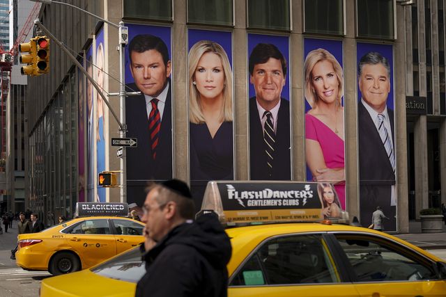 new york, ny   march 13 traffic on sixth avenue passes by advertisements featuring fox news personalities, including bret baier, martha maccallum, tucker carlson, laura ingraham, and sean hannity, adorn the front of the news corporation building, march 13, 2019 in new york city on wednesday the network's sales executives are hosting an event for advertisers to promote fox news fox news personalities tucker carlson and jeanine pirro have come under criticism in recent weeks for controversial comments and multiple advertisers have pulled away from their shows photo by drew angerergetty images
