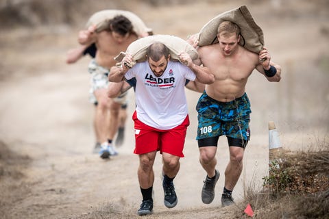 mat fraser carrying sandbag