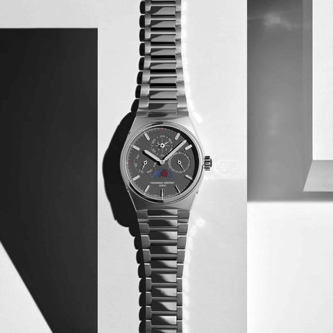 steel watch with geometric shapes