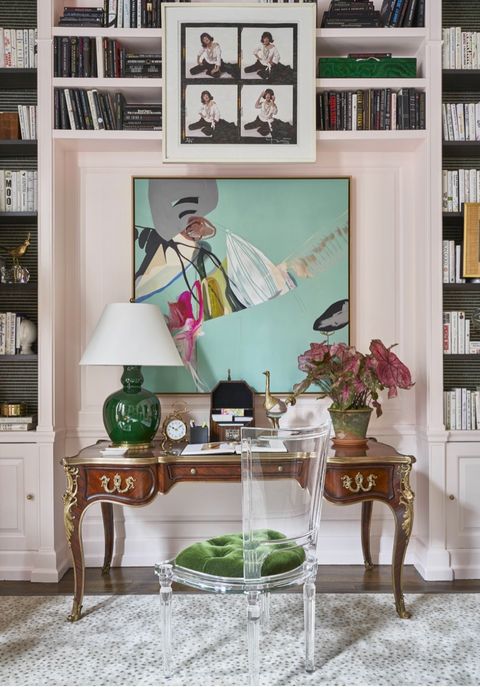 home office with green velvet and lucite chair