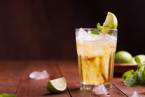 Fresh cocktail prepared with ginger beer, lime and ice