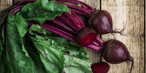 Fresh organic beetroot over wooden background