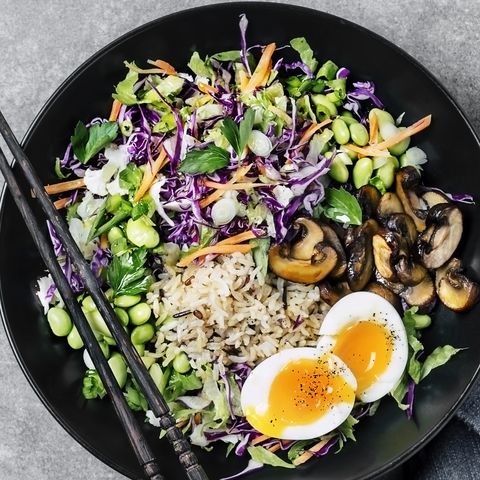 fresh salad with fried rice and boiled eggs