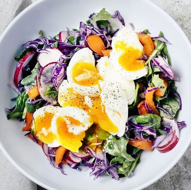 Fresh salad with soft boiled eggs