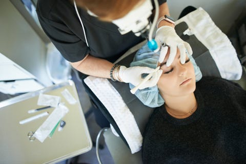 mikrobleyding eyebrows workflow in a beauty salon selective focus and shallow depth of field