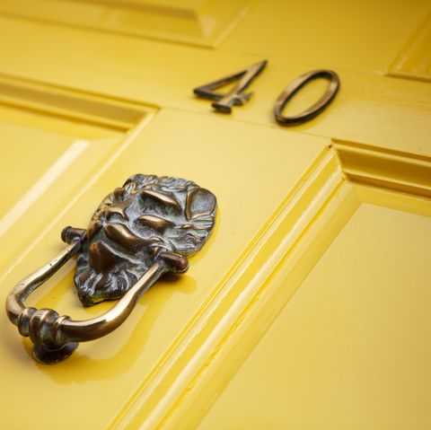 front door paint  yellow door with knocker