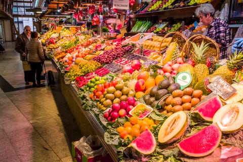 Fruits and vegetables are sold inside the Mercat de Sant...