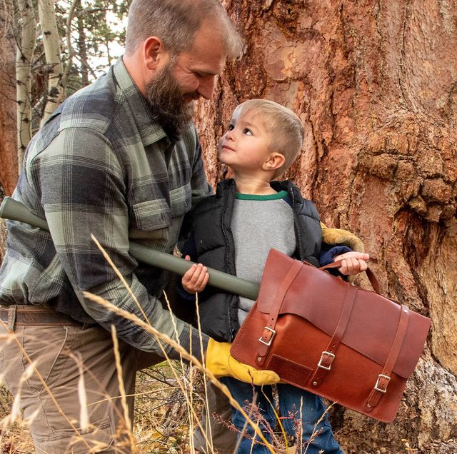 man giving son a forrest tool company kit