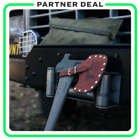 partner deal forrest tool company axe leaning against car