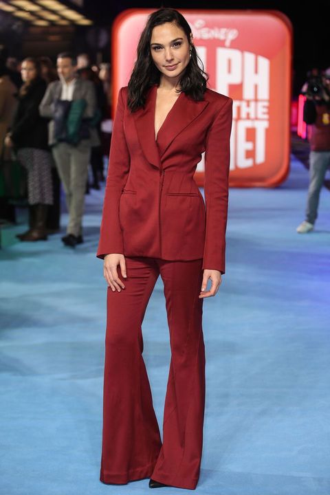 Gal Gadot wearing a red suit