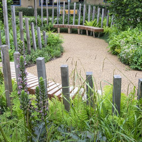 Timber posts in garden by Bowles & Wyer. Photo by Richard Bloom