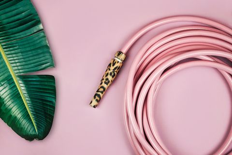 pink garden hose with a leopard print nozzle