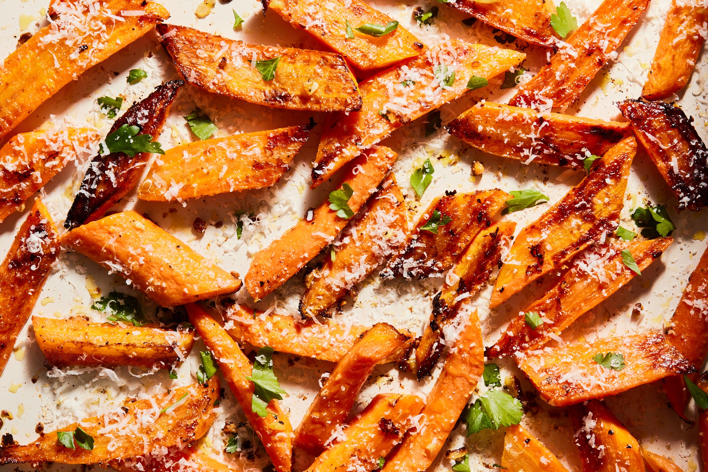 These Garlic-Parm Roasted Carrots Will Have You Kicking Green Veggies To The Curb